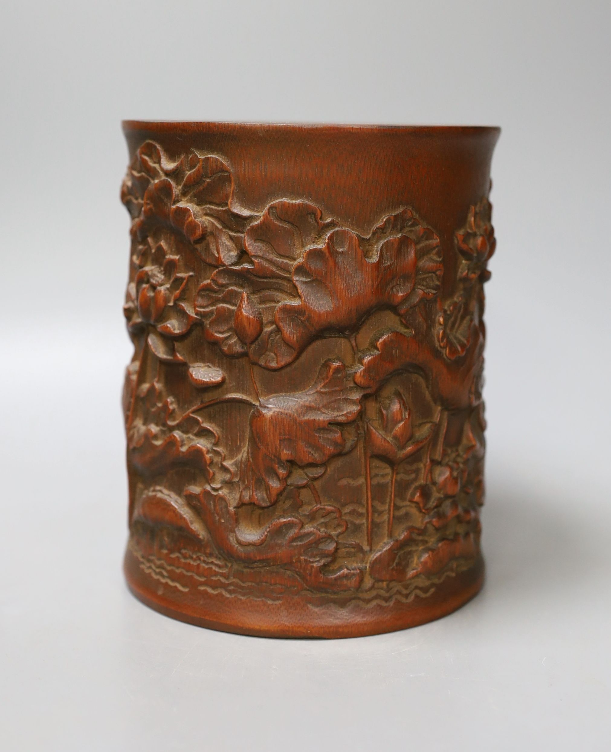 A Chinese carved bamboo brush pot - 15cm tall